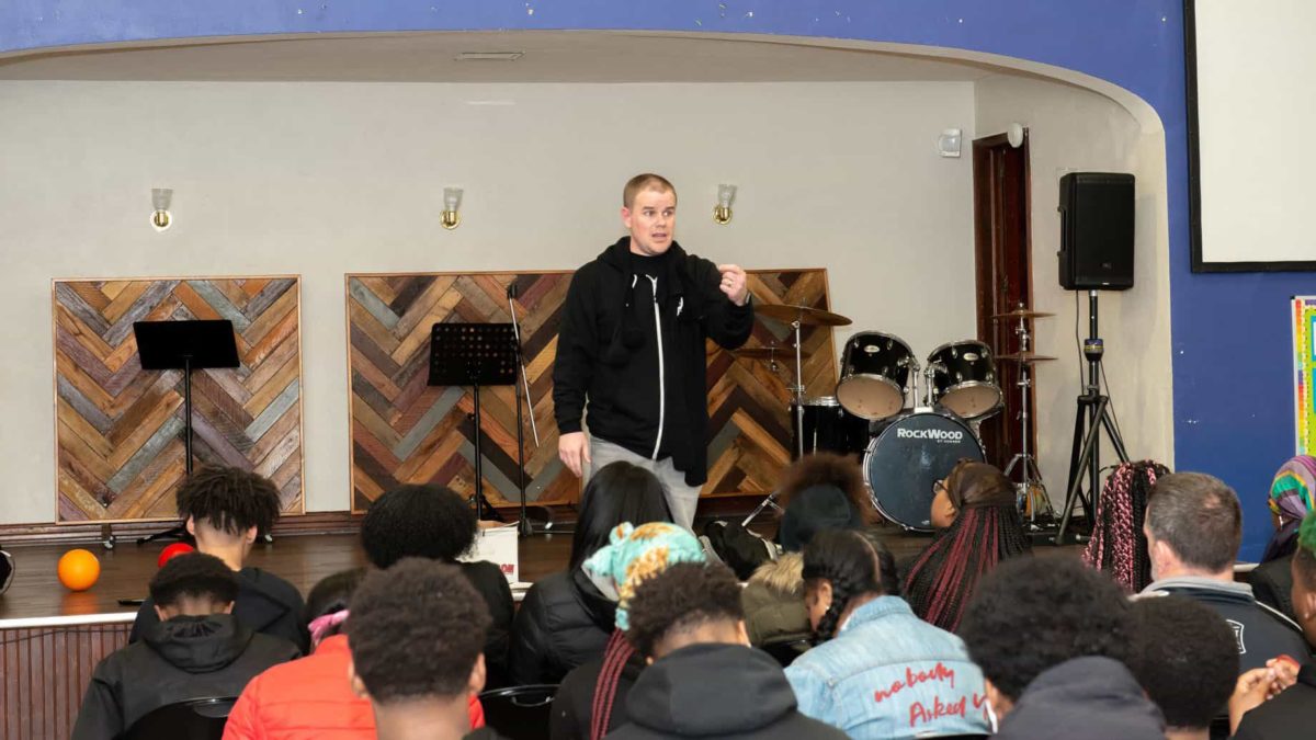 Pastor Josh Crans Addressing Youth At A Coatesville Community Center